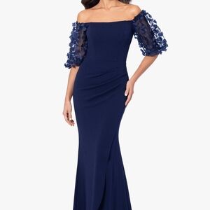 Xscape Navy Off-Shoulder gown with flower detail on sleeves. 16W